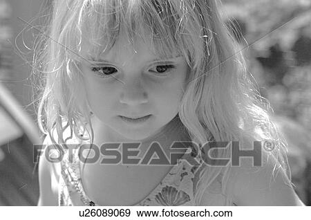 Close up of blond girl’s face in black & white View Large Photo Image Stock Photo - Close up of blond girl’s face in black & white. Fotosearch