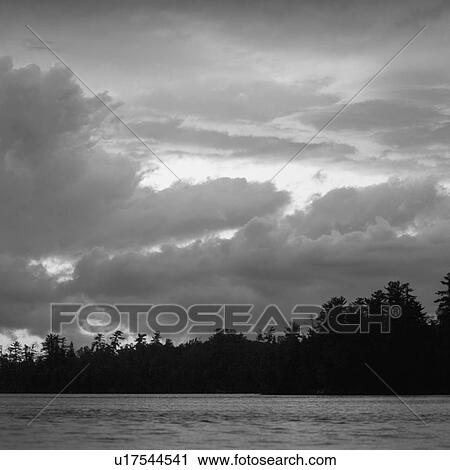 Cloudy sky over Lake of the woods, Ontario, Canada View Large Photo Image Stock Image - Cloudy sky over Lake of the woods, Ontario, Canada. Fotosearch