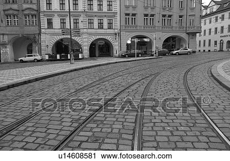 Tram rail tracks running through cobbled stone city streets View Large Photo Image Stock Image - Tram rail tracks running through cobbled stone city streets. Fotosearch