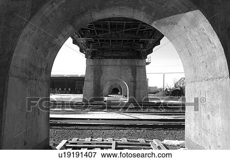 Stock Photo - Under Arlington Bridge, Winnipeg, Manitoba, Canada in winter. Fotosearch