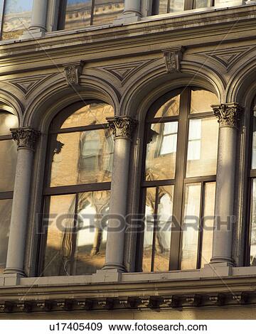 Reflection of buildings in window View Large Photo Image Stock Photo - Reflection of buildings in window. Fotosearch