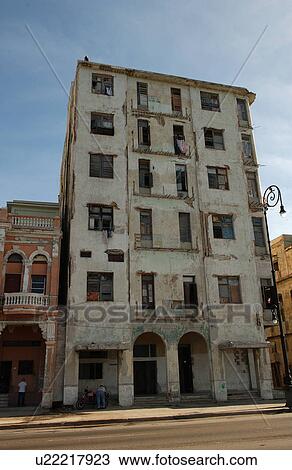 Stock Image - View of the facade of a dilapidated apartment building, Havana, Cuba. Fotosearch