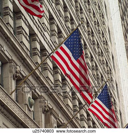 American flags outside a building View Large Photo Image Stock Image - American flags outside a building. Fotosearch