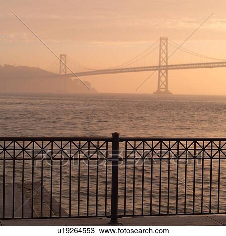 Stock Image - Bay Bridge at Sunset. Fotosearch