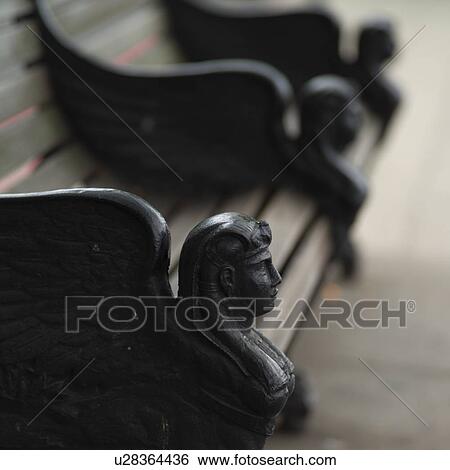 Close-up of the side of a carved park bench in London, England View Large Photo Image Stock Photograph - Close-up of the side of a carved park bench in London, England. Fotosearch