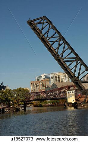 Opening draw bridge over a waterway View Large Photo Image Stock Image - Opening draw bridge over a waterway. Fotosearch