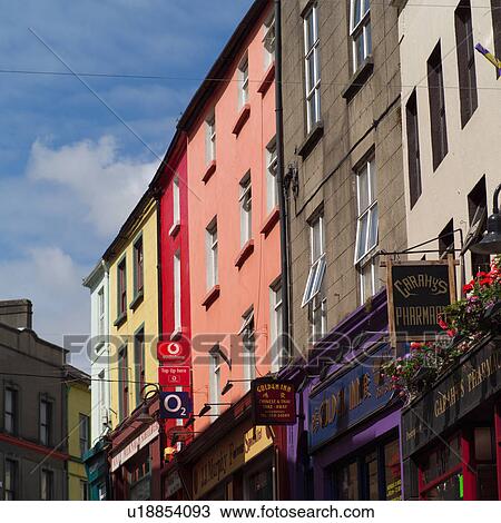 Buildings on street in Irish town View Large Photo Image Stock Image - Buildings on street in Irish town. Fotosearch