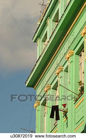 Low angle view of a painted commercial building View Large Photo Image Stock Photo - Low angle view of a painted commercial building. Fotosearch