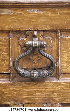 Close-up of handle on a wooden door View Large Photo Image Stock Image - Close-up of handle on a wooden door. Fotosearch