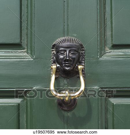door knocker on green door View Large Photo Image Stock Photography - door knocker on green door. Fotosearch