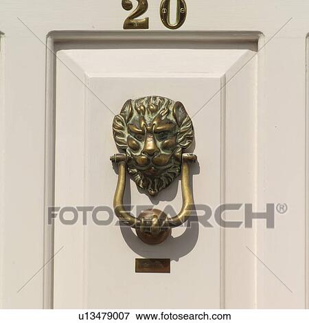 door knocker on white door View Large Photo Image Stock Photo - door knocker on white door. Fotosearch