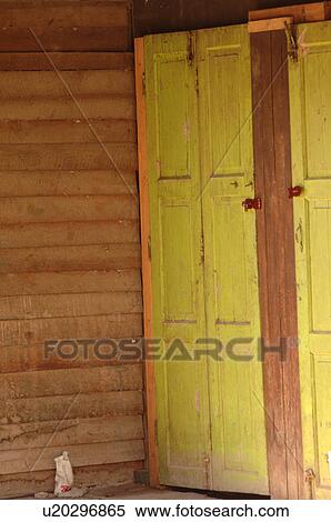 Stock Photography - Doors painted lime green. Fotosearch