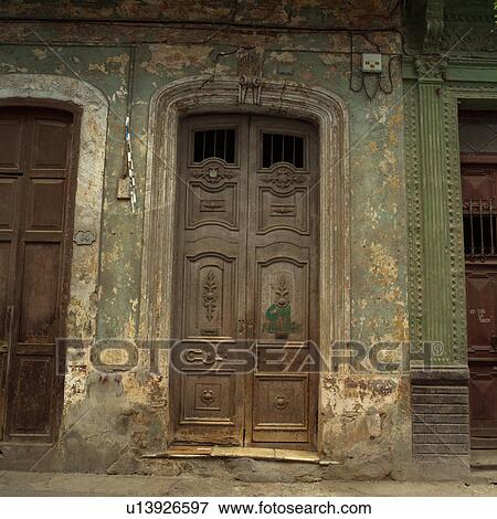 Wooden doors of an old building View Large Photo Image Stock Photo - Wooden doors of an old building. Fotosearch