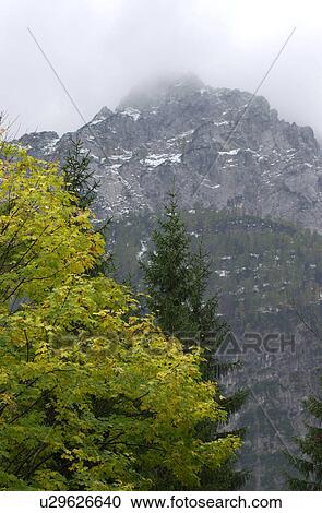 Stock Image - Snow covered mountain range in Slovenia. Fotosearch