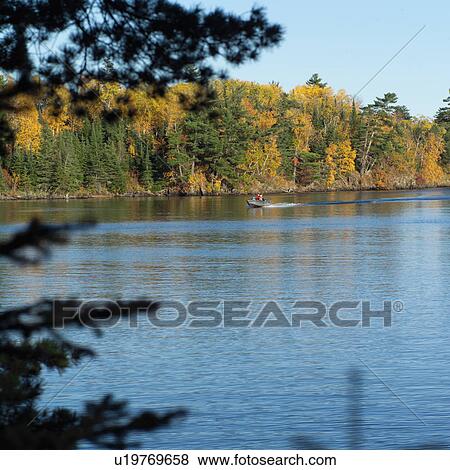Stock Photo - Motor Boat on Lake. Fotosearch