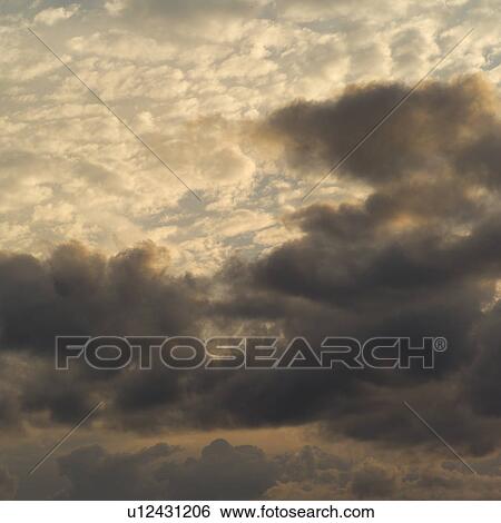 Close-up of clouds in the sky View Large Photo Image Stock Photograph - Close-up of clouds in the sky. Fotosearch