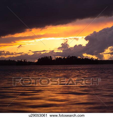 Cloudy sky over Lake of the woods, Ontario, Canada View Large Photo Image Stock Image - Cloudy sky over Lake of the woods, Ontario, Canada. Fotosearch