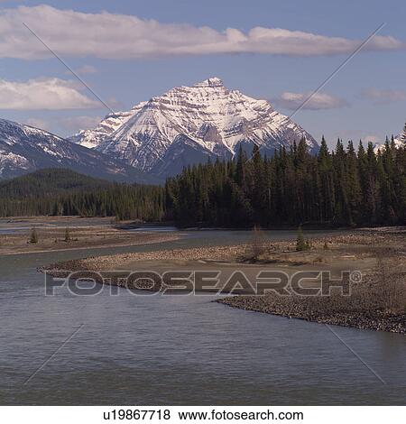 Stock Photo - River with mountain in background. Fotosearch