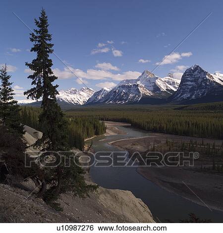 Stock Photograph - River with mountain in background. Fotosearch