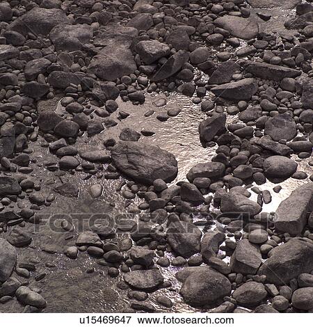 Rocks and water View Large Photo Image Stock Photo - Rocks and water. Fotosearch