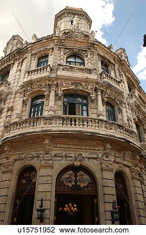 Low angle view of the facade of an ornate building, Havana, Cuba View Large Photo Image Stock Image - Low angle view of the facade of an ornate building, Havana, Cuba. Fotosearch