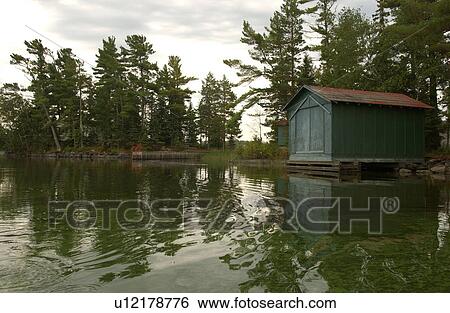 Cabin built by Lake of the woods, Ontario, Canada View Large Photo Image Stock Photograph - Cabin built by Lake of the woods, Ontario, Canada. Fotosearch