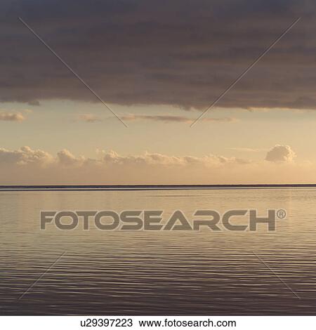 Stock Image - Horizon over Ocean at Moorea in Tahiti. Fotosearch