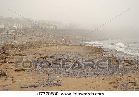 Stock Image - Ireland - beach in fog. Fotosearch