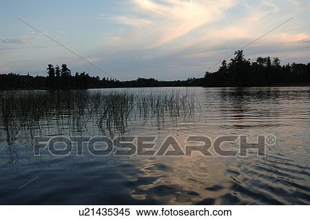 Lake of the Woods at twilight View Large Photo Image Stock Photography - Lake of the Woods at twilight. Fotosearch