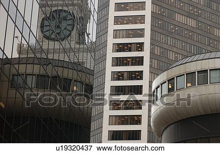 Stock Photo - Building Reflecting Clock. Fotosearch
