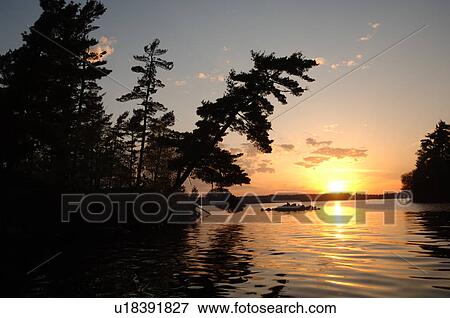 Stock Photo - Lake of the Woods at twilight. Fotosearch