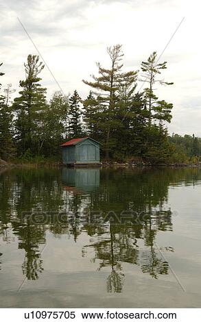 Stock Photography - Cabin built by Lake of the woods, Ontario, Canada. Fotosearch
