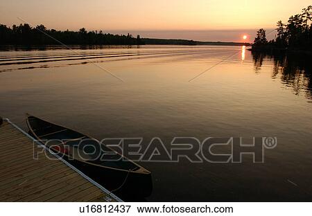 Stock Photo - Sunset views from dock. Fotosearch