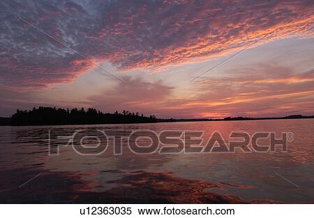 Lake Photography - Sunset over Island View Large Photo Image Stock Photography - Lake Photography - Sunset over Island. Fotosearch