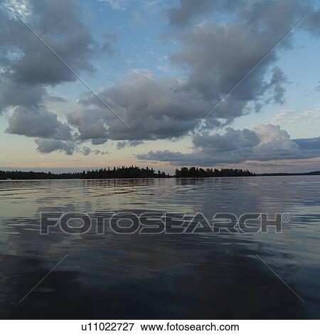 Overcast sky over Lake of the woods, Ontario, Canada View Large Photo Image Stock Photo - Overcast sky over Lake of the woods, Ontario, Canada. Fotosearch