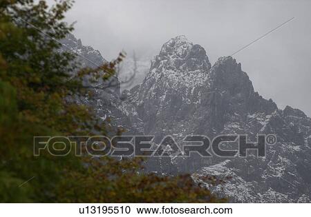 Stock Image - Snow covered mountain range in Slovenia. Fotosearch