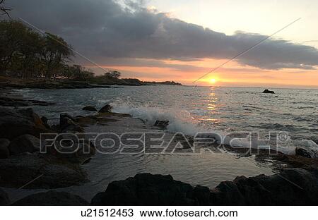 Stock Image - Big Island of Hawaii - sunset from beach. Fotosearch