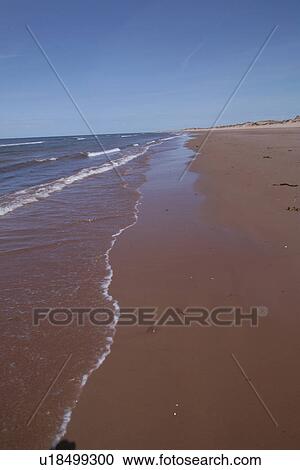 Stock Image - Deserted beach in Prince Edward Island, Canada. Fotosearch