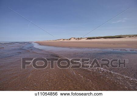 Stock Photograph - Deserted beach in Prince Edward Island, Canada. Fotosearch