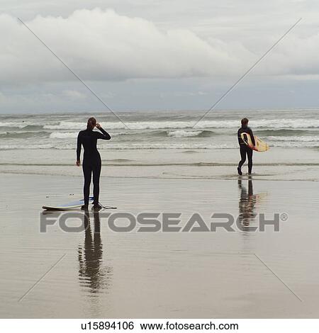 Surfers with surfboards on beach, Pacific Rim Park, Vancouver Island, Canada View Large Photo Image Stock Photograph - Surfers with surfboards on beach, Pacific Rim Park, Vancouver Island, Canada. Fotosearch
