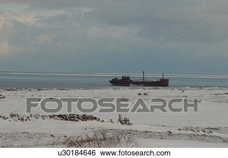 Stock Photograph - Churchill Northern Manitoba town and surroundings Ship on water. Fotosearch
