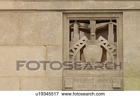 Carved stone wall of a building View Large Photo Image Stock Photo - Carved stone wall of a building. Fotosearch