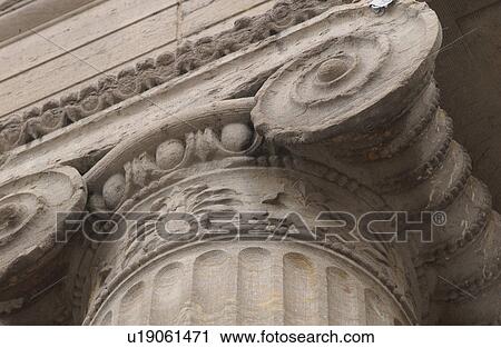 Low angle view of a carved stone pillar of a building View Large Photo Image Stock Image - Low angle view of a carved stone pillar of a building. Fotosearch