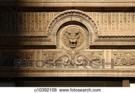 Stone carvings on a wall of a building View Large Photo Image Stock Photo - Stone carvings on a wall of a building. Fotosearch