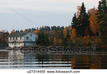 Boathouse Surrounded with Autumn Colors View Large Photo Image Stock Photo - Boathouse Surrounded with Autumn Colors. Fotosearch