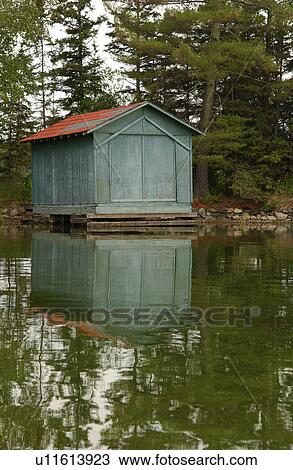 Stock Image - Cabin built by Lake of the woods, Ontario, Canada. Fotosearch