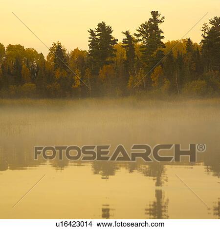 Mist over Lake View Large Photo Image Picture - Mist over Lake. Fotosearch