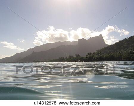 Panoramic view of hills near an ocean, Moorea, Tahiti, French Polynesia, South Pacific View Large Photo Image Stock Photo - Panoramic view of hills near an ocean, Moorea, Tahiti, French Polynesia, South Pacific. Fotosearch