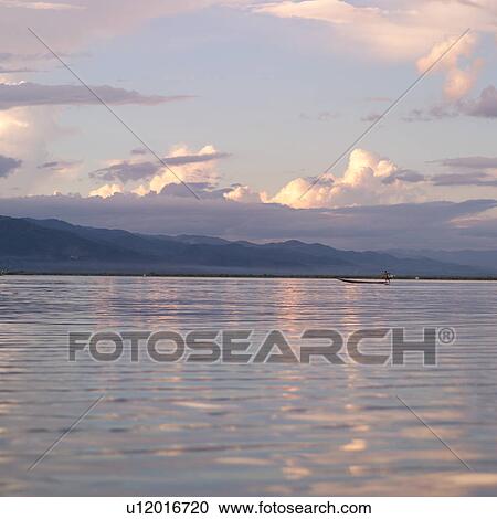 Stock Image - Boat on Inle Lake. Fotosearch