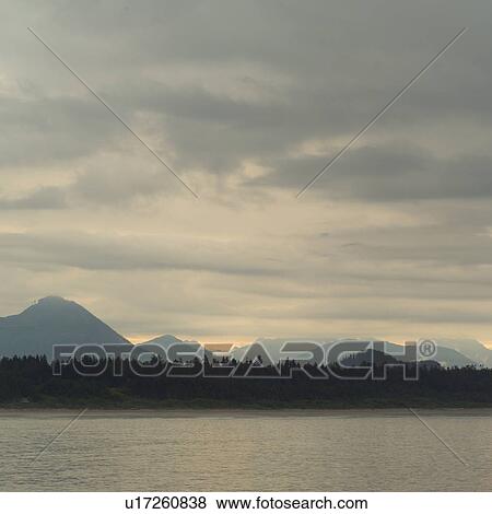 Stock Photo - Sunrise Seascape View of Pacific Ocean, Pacific Rim Park, Vancouver Island, Canada. Fotosearch